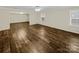 Empty bedroom featuring tile floors, neutral paint, and a ceiling fan at 670 Sherwood Pl, Mooresville, NC 28115