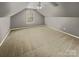 Bright, carpeted bedroom featuring a window and neutral paint at 670 Sherwood Pl, Mooresville, NC 28115