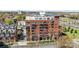 Brick apartment building featuring balconies and cityscape views at 715 N Church St # 503, Charlotte, NC 28202