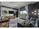 Inviting living room with plush seating, modern décor, and a sliding glass door to a balcony at 715 N Church St # 503, Charlotte, NC 28202