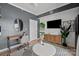 Chic living room with a modern desk, stylish furnishings, and a bright, airy feel at 715 N Church St # 503, Charlotte, NC 28202