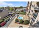 Elevated view showcasing the in-ground pool, green spaces, and building layout of the complex at 715 N Church St # 503, Charlotte, NC 28202