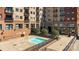 Relaxing in-ground pool with manicured green space, creating a serene outdoor retreat for residents at 715 N Church St # 503, Charlotte, NC 28202