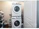 Convenient laundry area with stacked washer and dryer units, maximizing space at 769 Seigle Point Dr, Charlotte, NC 28204