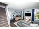 Cozy living room with hardwood floors, ample sunlight, and comfortable seating. Perfect for relaxation at 769 Seigle Point Dr, Charlotte, NC 28204