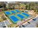 Aerial view of community tennis courts, playground, and visitor parking at 769 Seigle Point Dr, Charlotte, NC 28204