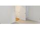 Bright bedroom with neutral carpeting, white trim, and multiple closets for ample storage at 8011 Greencastle Dr, Charlotte, NC 28210