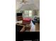 Bonus room with natural light, pool table, and comfortable seating at 8011 Greencastle Dr, Charlotte, NC 28210