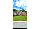 Well-maintained brick home with manicured lawn at 8011 Greencastle Dr, Charlotte, NC 28210
