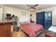Inviting bedroom with ceiling fan, and closet with sliding glass doors at 8175 Cedar Glen Dr, Charlotte, NC 28212