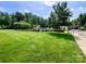 Beautiful community pool area with lush landscaping, seating, and a welcoming atmosphere at 8212 Merryvale Ln, Charlotte, NC 28214