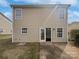 Back of house featuring a patio and sliding door access to the backyard at 8715 Green Ivy Ln, Charlotte, NC 28217