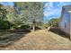 Expansive backyard with a deck attached to the house, trees, and plenty of space at 914 Saluda St, Rock Hill, SC 29730