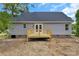 Backyard featuring a newly constructed wooden deck and siding, complemented by a large backyard at 914 Saluda St, Rock Hill, SC 29730