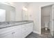 This bathroom features granite countertops with double sinks and white cabinets at 914 Saluda St, Rock Hill, SC 29730