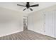 This bedroom features neutral walls and floors, a ceiling fan, and access to other rooms at 914 Saluda St, Rock Hill, SC 29730