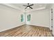 Light-filled bedroom featuring tray ceiling, ceiling fan, and beautiful windows for ample natural light at 914 Saluda St, Rock Hill, SC 29730