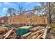 View of the new home construction with lumber and brick base on a clear day at 914 Saluda St, Rock Hill, SC 29730