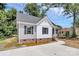 Charming exterior featuring modern gray and white design with brick foundation and driveway at 914 Saluda St, Rock Hill, SC 29730