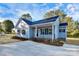 Charming single-story home with a covered front porch, neat landscaping, and a concrete driveway at 914 Saluda St, Rock Hill, SC 29730