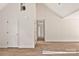 Unfinished hallway with wood flooring, white doors, and white trim at 914 Saluda St, Rock Hill, SC 29730