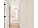 Bright hallway featuring hardwood floors and neutral walls leading to additional rooms at 914 Saluda St, Rock Hill, SC 29730