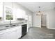 Bright kitchen/dining nook with modern lighting and view of rear deck at 914 Saluda St, Rock Hill, SC 29730