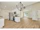Spacious kitchen with stainless steel appliances opens to a bright living room with vaulted ceilings at 914 Saluda St, Rock Hill, SC 29730