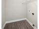 Small but efficient laundry room with modern flooring and convenient shelving for storage at 914 Saluda St, Rock Hill, SC 29730