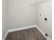 The functional laundry room is equipped with modern flooring and convenient shelving at 914 Saluda St, Rock Hill, SC 29730