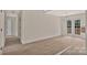 Unfinished living room with wood flooring, chandelier, and French doors at 914 Saluda St, Rock Hill, SC 29730