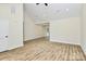 Open concept living room boasting vaulted ceilings, recessed lighting, and beautiful wood-look flooring at 914 Saluda St, Rock Hill, SC 29730