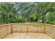 Newly constructed wooden deck overlooking a private, partially wooded backyard at 914 Saluda St, Rock Hill, SC 29730