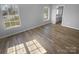 Sun-filled bedroom with spacious layout, large windows, and ensuite bathroom at 9144 Cameron Wood Dr, Charlotte, NC 28210