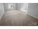 Bedroom featuring a neutral carpet and shelving at 9144 Cameron Wood Dr, Charlotte, NC 28210