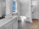 Bright bathroom with double vanity and tub/shower combo at 1025 Ridgefield Cir, Indian Trail, NC 28079