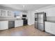 Bright kitchen features stainless steel appliances, ample counter space, and modern fixtures at 1025 Ridgefield Cir, Indian Trail, NC 28079