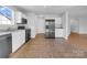Well-appointed kitchen with stainless steel appliances, tiled floor, and plenty of storage space at 1025 Ridgefield Cir, Indian Trail, NC 28079