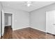 Bedroom with hardwood floors and ceiling fan at 10663 Hill Point Ct, Charlotte, NC 28262