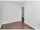 Neutral bedroom showcasing hardwood floors and simple design at 10663 Hill Point Ct, Charlotte, NC 28262