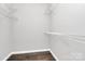 Walk-in closet featuring white wire shelving at 10663 Hill Point Ct, Charlotte, NC 28262