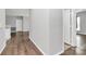 Open-concept space features hardwood floors, neutral walls, and a bright atmosphere at 10663 Hill Point Ct, Charlotte, NC 28262