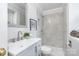 Bathroom with a modern vanity, tiled shower, and brushed nickel fixtures at 107 Grand Canyon Rd, Stanley, NC 28164