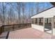 Spacious wooden deck overlooking a serene wooded area, perfect for outdoor entertaining at 107 Grand Canyon Rd, Stanley, NC 28164