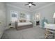 Comfortable bedroom with a daybed, adjacent desk, and an ensuite bathroom at 110 49Th Avenue Nw Pl, Hickory, NC 28601