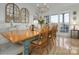 Elegant dining room featuring a large table, chandelier, and lots of natural light at 110 49Th Avenue Nw Pl, Hickory, NC 28601