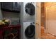Functional laundry area with stacked washer/dryer, offering convenience and efficient use of space at 110 49Th Avenue Nw Pl, Hickory, NC 28601