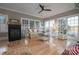 Cozy living room with fireplace, hardwood floors, and abundant natural light creates a warm atmosphere at 110 49Th Avenue Nw Pl, Hickory, NC 28601