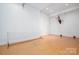 Bright recreation room features hardwood floors and a basketball hoop at 110 49Th Avenue Nw Pl, Hickory, NC 28601