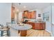 Well-lit kitchen featuring granite countertops, stainless steel appliances, and a breakfast bar at 1108 Stella Ct, Monroe, NC 28110